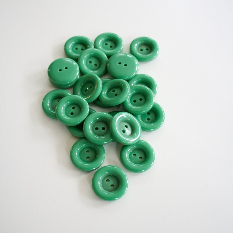 Turkoosi muovinappi 25mm